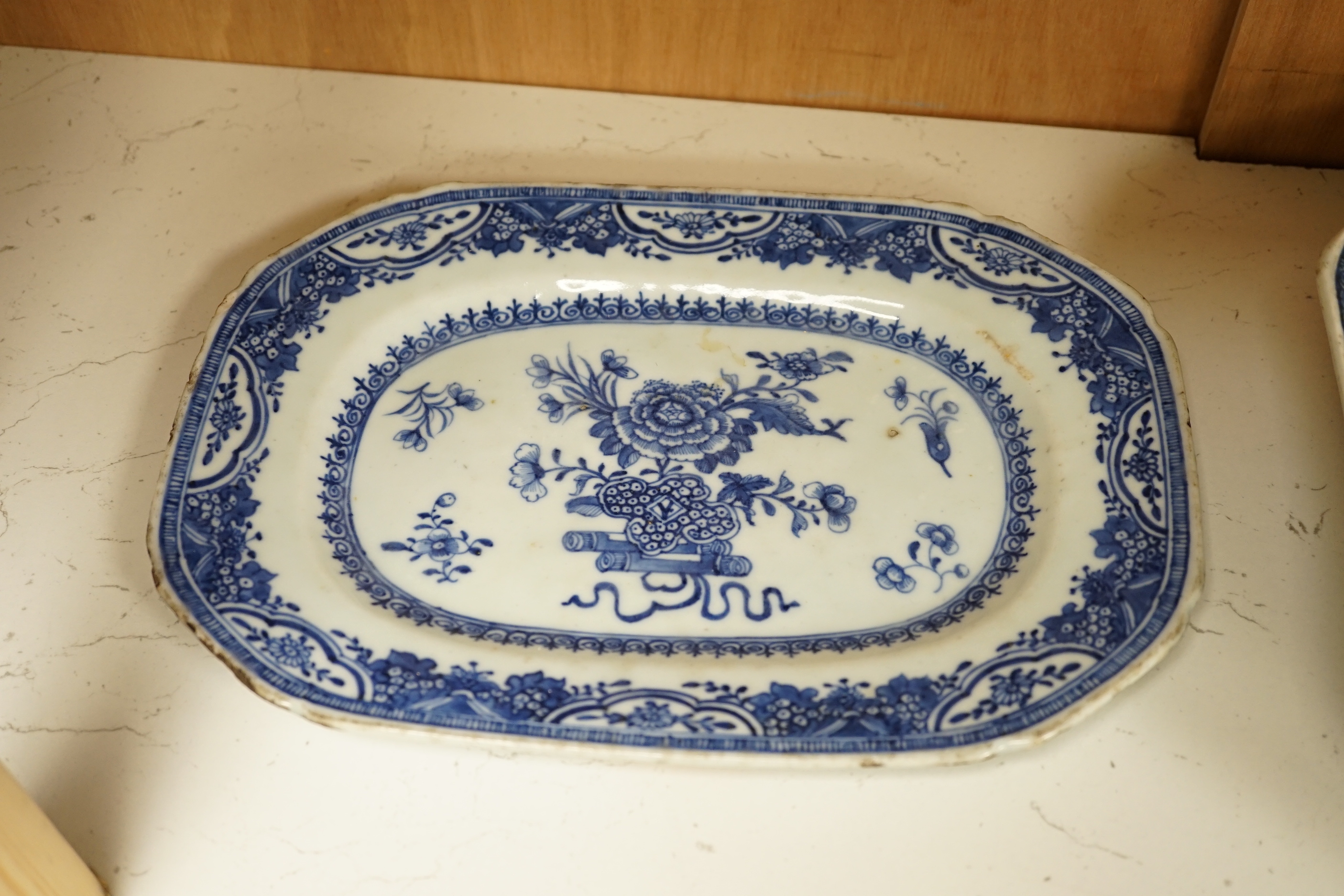 Three 18th century Chinese blue and white serving dishes and a similar plate, largest 38cm